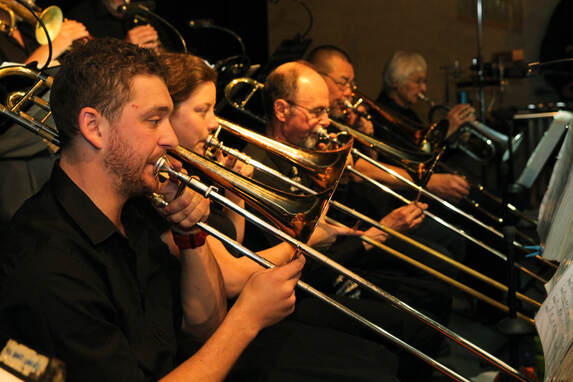 MoJO trombone players in action